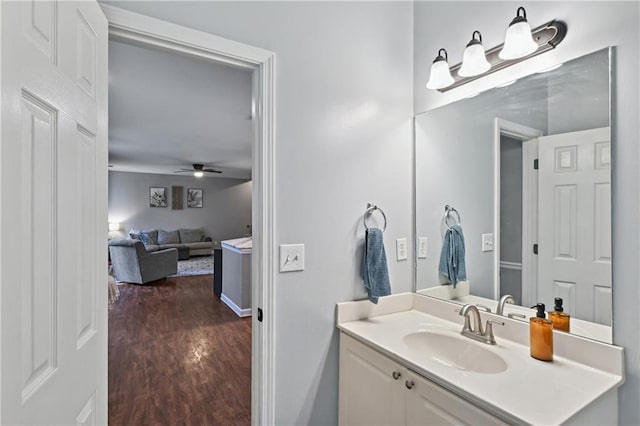 1185 Charter Club Dr, Lawrenceville, GA 30043 - bathroom with a ceiling fan, wood finished floors, and vanity