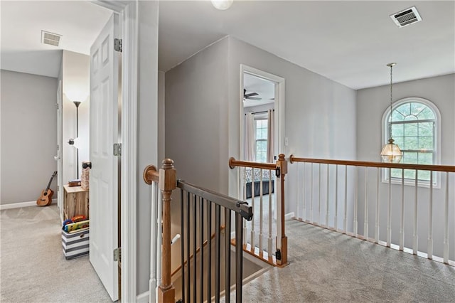 1185 Charter Club Dr, Lawrenceville, GA 30043 - hallway featuring an upstairs landing, carpet flooring, and baseboards