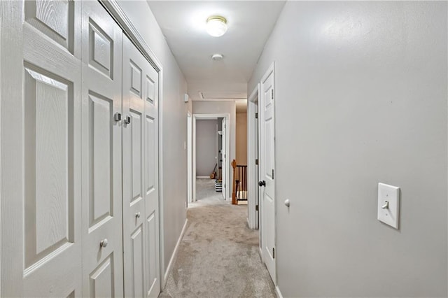 1185 Charter Club Dr, Lawrenceville, GA 30043 - corridor featuring light carpet, baseboards, and attic access