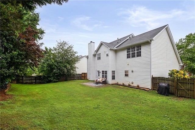 1185 Charter Club Dr, Lawrenceville, GA 30043 - back of property with a patio and a chimney