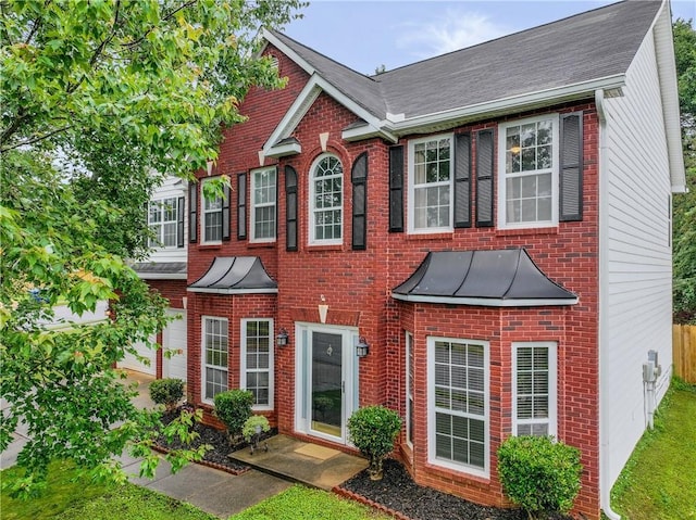 1185 Charter Club Dr, Lawrenceville, GA 30043 - view of front of home featuring brick siding and roof with shingles