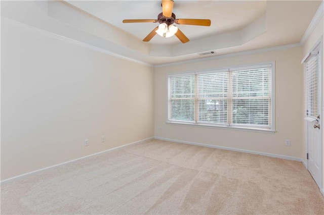 529 Ridge View Xing, Woodstock, GA 30188 - unfurnished room with a raised ceiling, light colored carpet, crown molding, ceiling fan, and baseboards