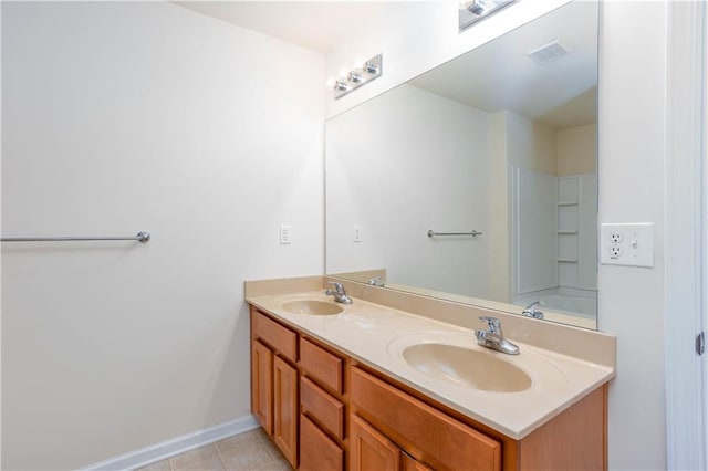 529 Ridge View Xing, Woodstock, GA 30188 - full bathroom featuring double vanity, baseboards, and tile patterned flooring