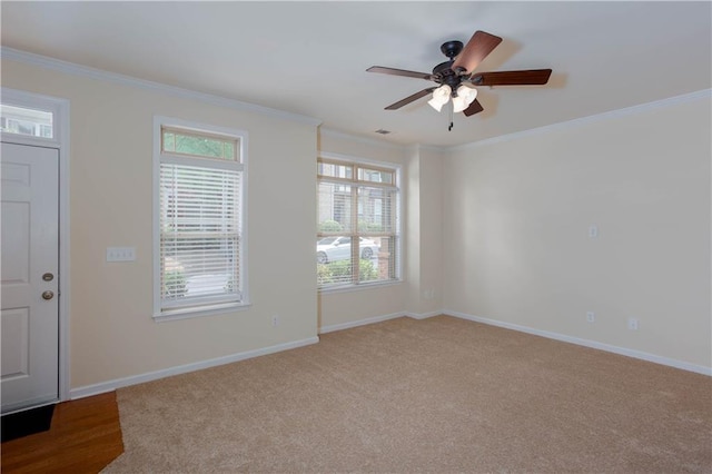 529 Ridge View Xing, Woodstock, GA 30188 - spare room with crown molding, a ceiling fan, baseboards, and carpet floors
