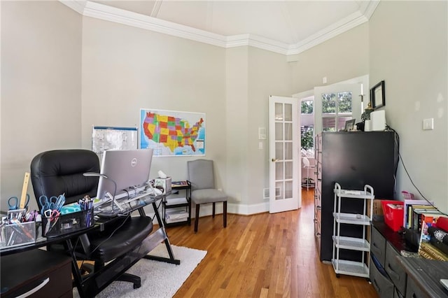 1213 Grande Vw, Loganville, GA 30052 - office area with crown molding, wood finished floors, a high ceiling, and french doors