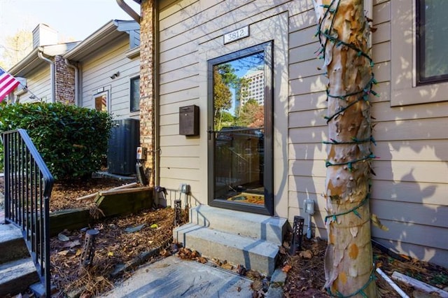 property entrance featuring cooling unit