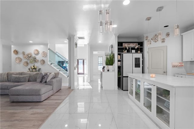 living room featuring crown molding