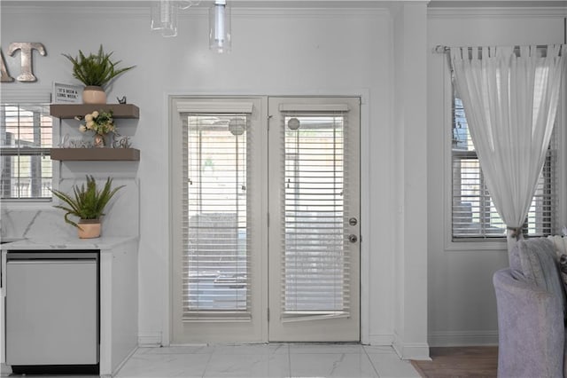 doorway featuring crown molding