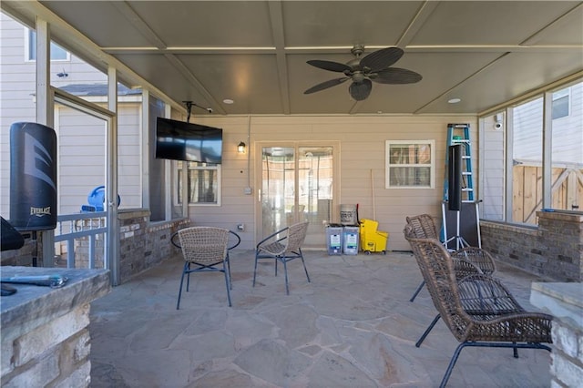 view of patio featuring ceiling fan