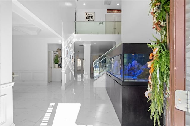 foyer with ornate columns