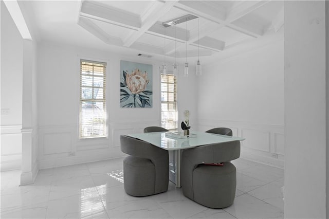 dining area featuring coffered ceiling, ornamental molding, and beam ceiling