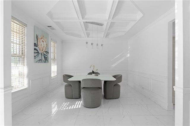 dining space featuring ornamental molding, plenty of natural light, beam ceiling, and coffered ceiling