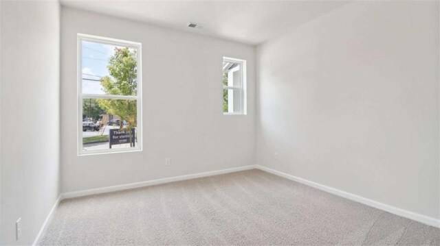 204 College Cir Unit 1003, Hapeville, GA 30354 - view of carpeted empty room