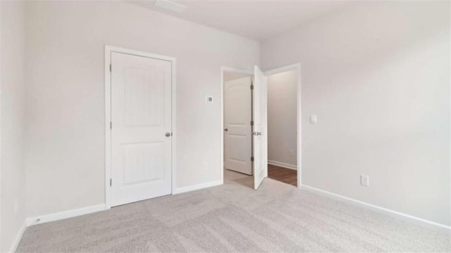 204 College Cir Unit 1003, Hapeville, GA 30354 - unfurnished bedroom with light carpet