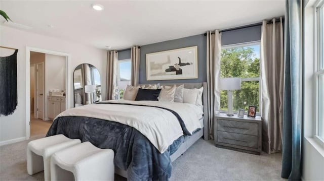 204 College Cir Unit 1003, Hapeville, GA 30354 - carpeted bedroom featuring multiple windows and connected bathroom