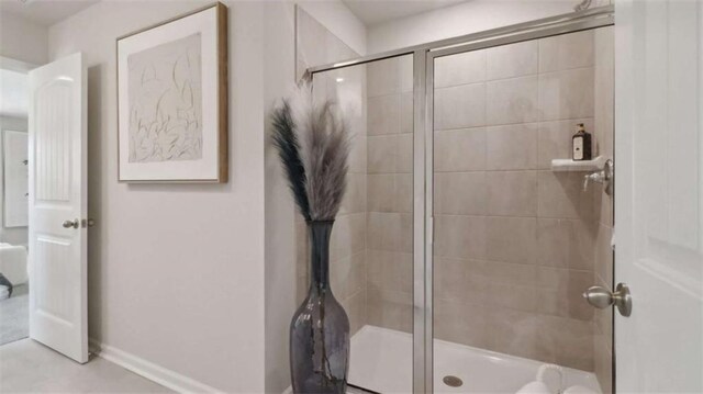 204 College Cir Unit 1003, Hapeville, GA 30354 - bathroom featuring a shower with shower door