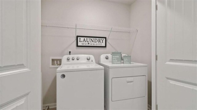 204 College Cir Unit 1003, Hapeville, GA 30354 - washroom featuring washing machine and dryer