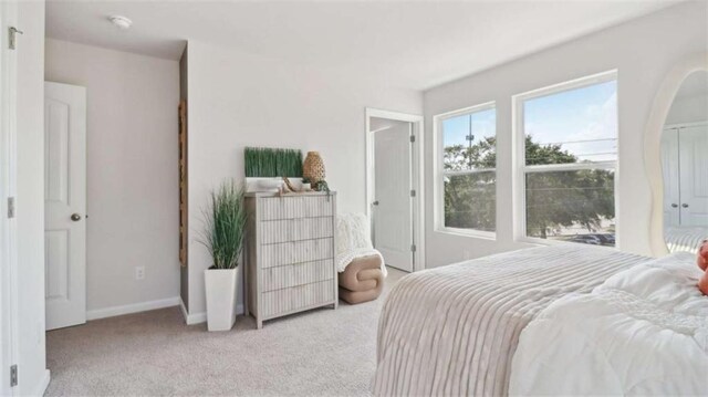 204 College Cir Unit 1003, Hapeville, GA 30354 - bedroom featuring light carpet