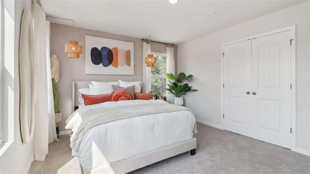 204 College Cir Unit 1003, Hapeville, GA 30354 - bedroom with light carpet and a closet