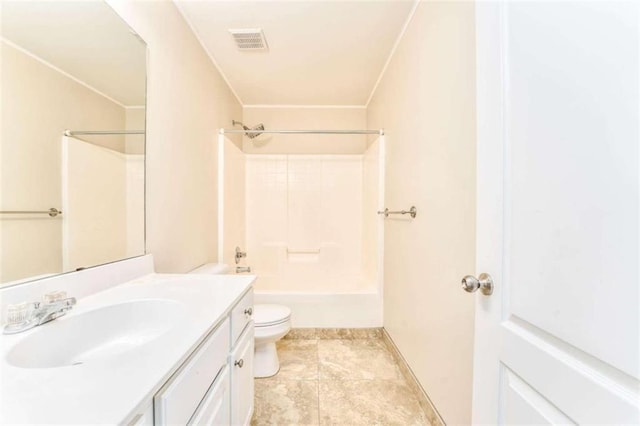 full bath with vanity, toilet, visible vents, and shower / bath combination