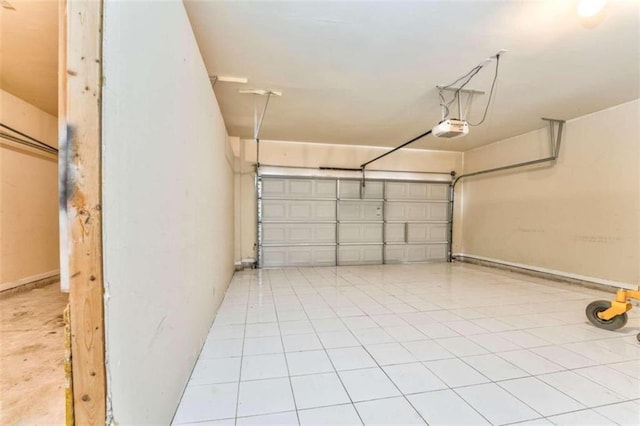 garage featuring a garage door opener