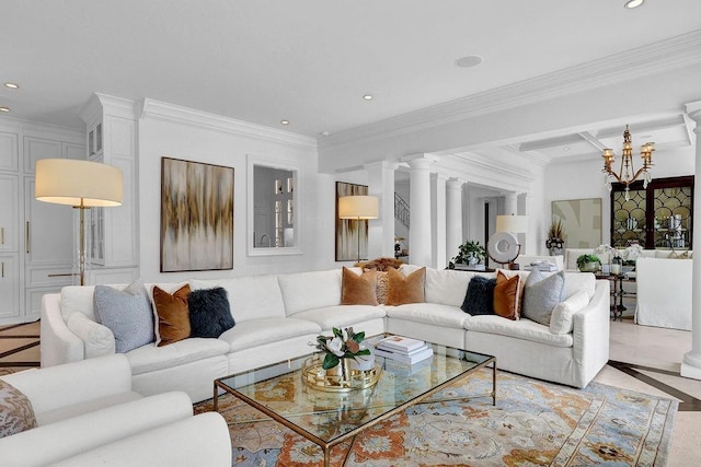 living room with beamed ceiling, decorative columns, and crown molding