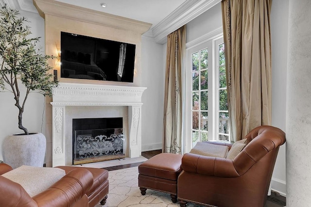 living room featuring ornamental molding and a wealth of natural light