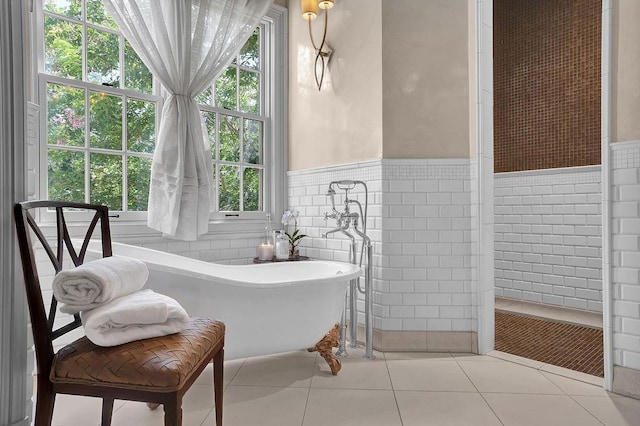 bathroom featuring tile walls and tile floors