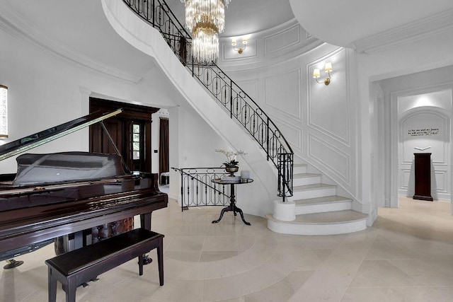 misc room featuring ornamental molding, a chandelier, and light tile floors