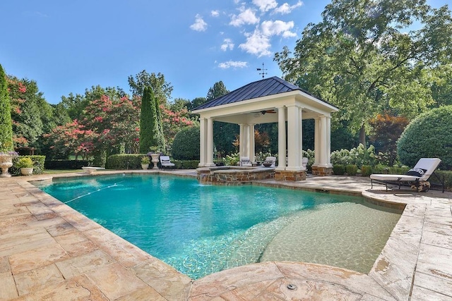 view of pool with a patio area and a gazebo