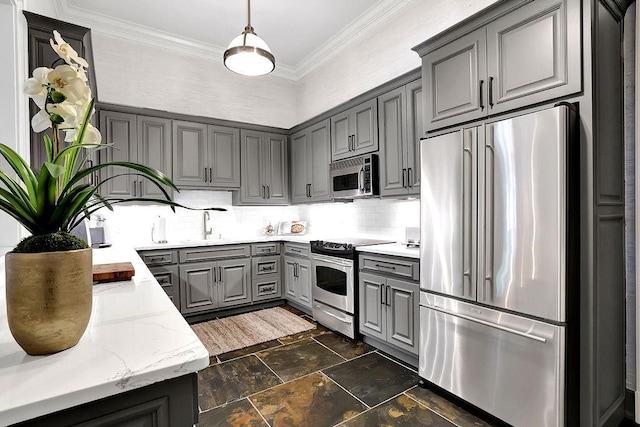 kitchen with tasteful backsplash, stainless steel appliances, gray cabinets, and dark tile flooring