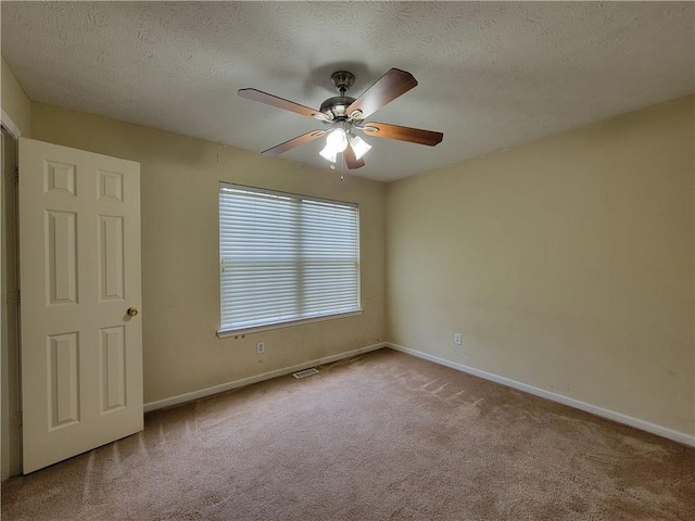 180 Preston Oaks Dr, Johns Creek, GA 30022 - unfurnished room with carpet flooring, ceiling fan, and a textured ceiling