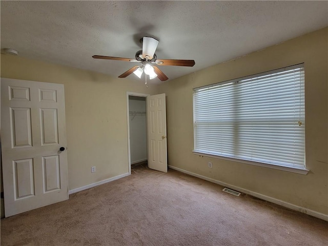 180 Preston Oaks Dr, Johns Creek, GA 30022 - unfurnished bedroom featuring carpet floors, a closet, and ceiling fan
