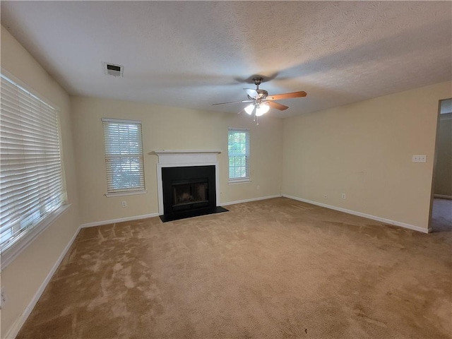 180 Preston Oaks Dr, Johns Creek, GA 30022 - unfurnished living room featuring a ceiling fan, carpet flooring, and a fireplace with flush hearth