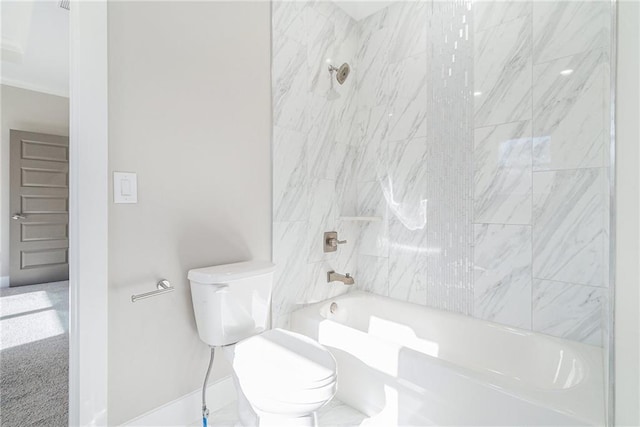 bathroom with tub / shower combination and toilet