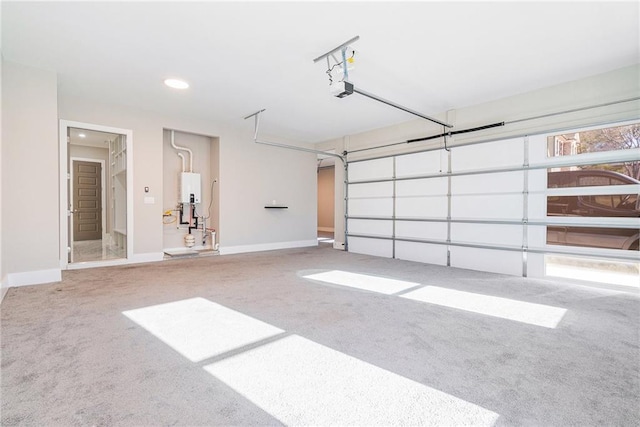 garage featuring a garage door opener, recessed lighting, water heater, and baseboards