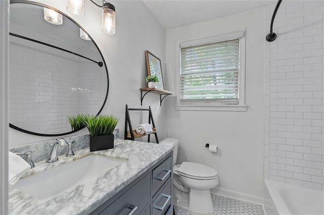 bathroom featuring shower / tub combination, baseboards, toilet, tile patterned floors, and vanity