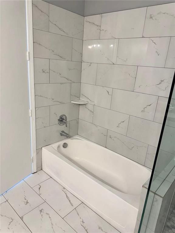 711 Cosmopolitan Dr NE Unit 426, Atlanta, GA 30324 - bathroom with marble finish floors and shower / bathtub combination