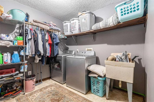 6230 S Summers Cir S, Douglasville, GA 30135 - laundry room featuring independent washer and dryer and a textured ceiling