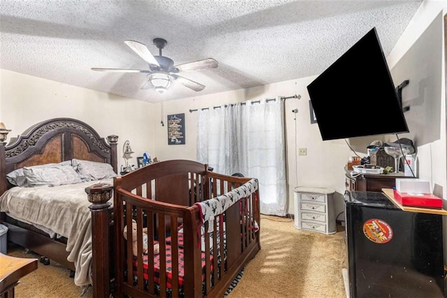 6230 S Summers Cir S, Douglasville, GA 30135 - bedroom featuring light colored carpet, ceiling fan, and a textured ceiling