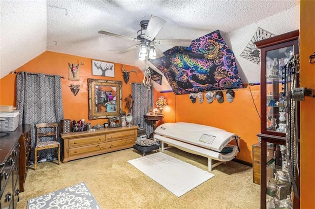 6230 S Summers Cir S, Douglasville, GA 30135 - bedroom featuring vaulted ceiling, carpet flooring, a textured ceiling, and a ceiling fan