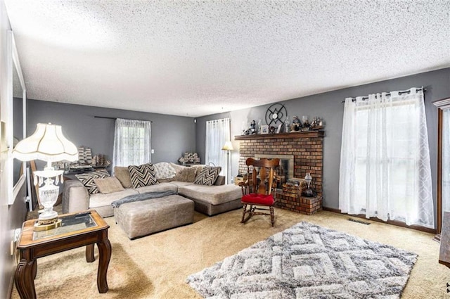 6230 S Summers Cir S, Douglasville, GA 30135 - carpeted living area featuring a textured ceiling and a brick fireplace