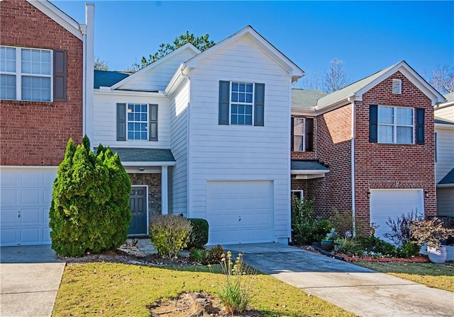 view of front of property with a garage