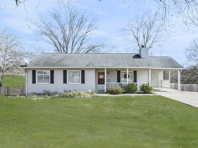 single story home featuring an attached carport, a front lawn, fence, covered porch, and a chimney