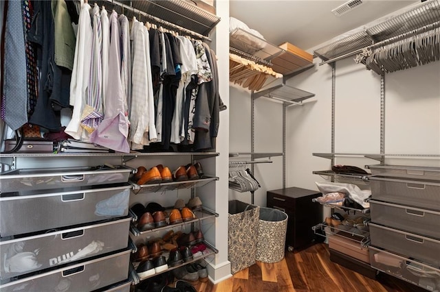 half bathroom with vanity and toilet