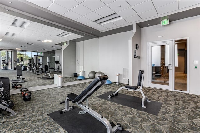 building lobby with ornamental molding and recessed lighting