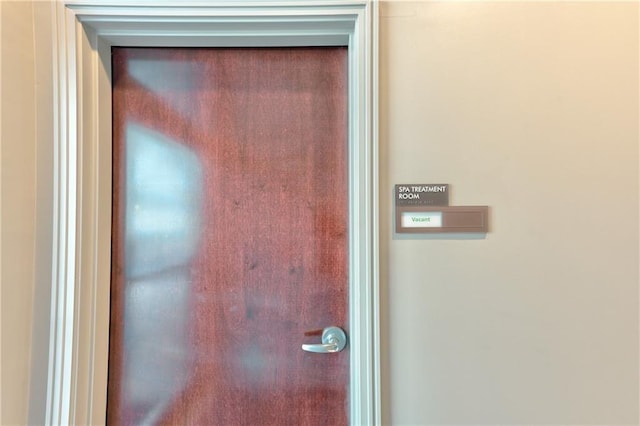 hall featuring carpet flooring, baseboards, and recessed lighting