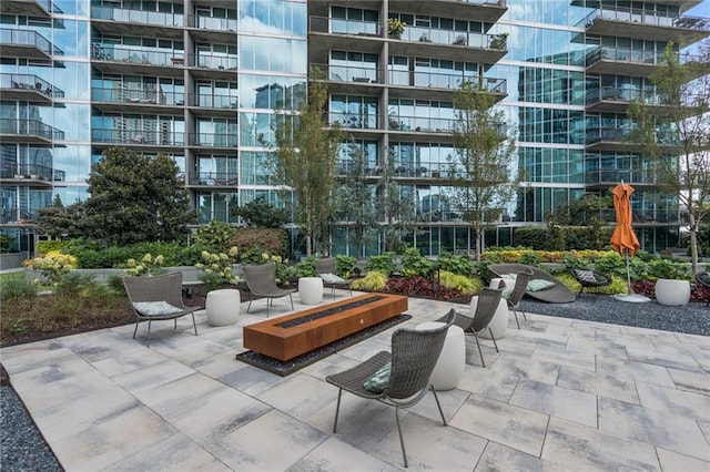 surrounding community featuring a patio