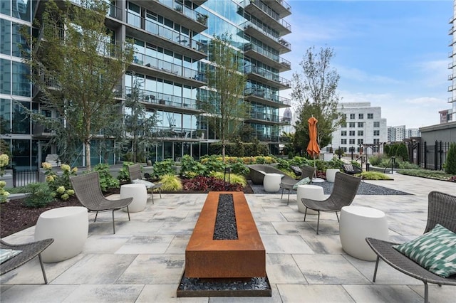 view of home's community with a patio area