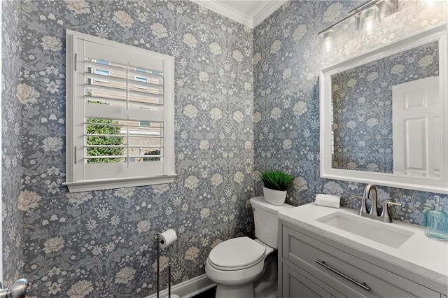 half bath featuring wallpapered walls, vanity, toilet, and crown molding